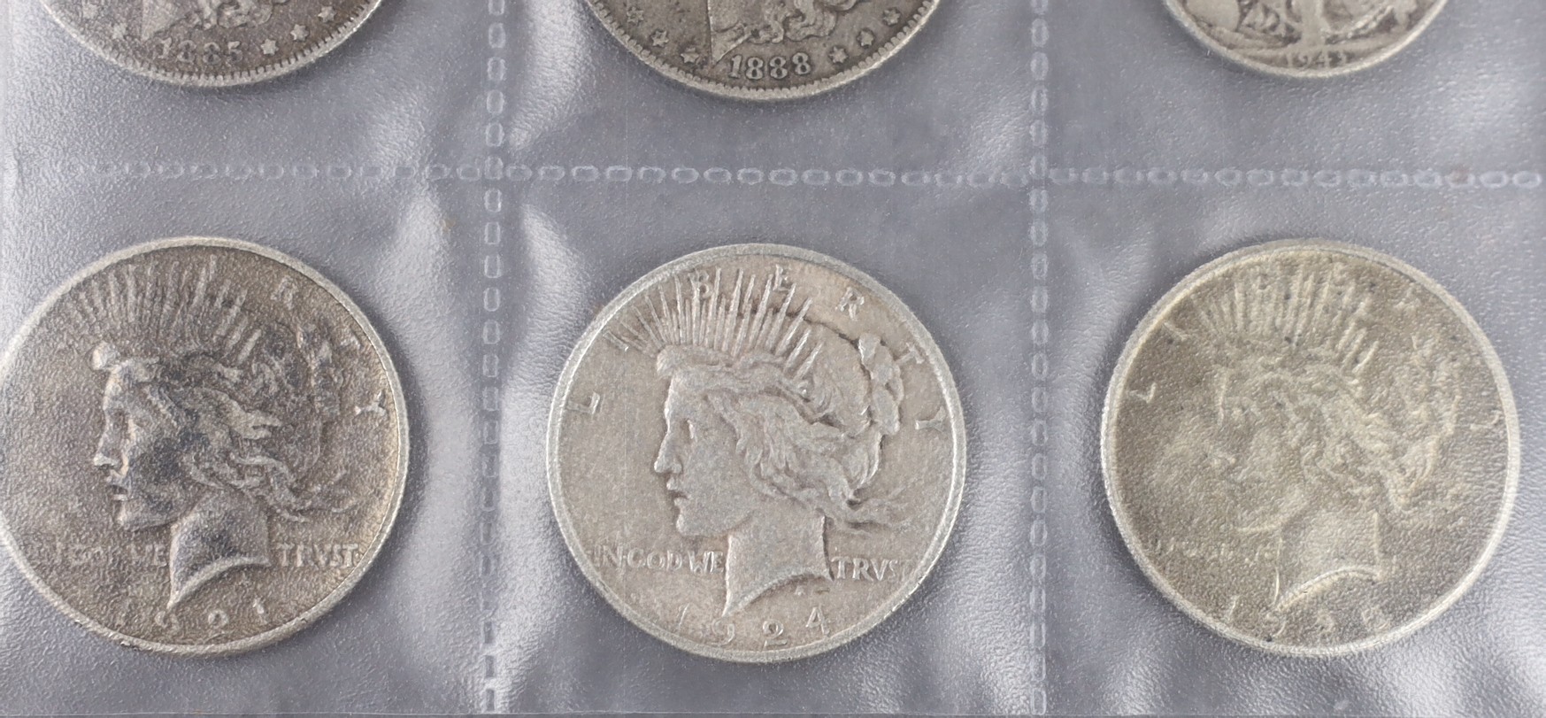 U.S.A. coins, five Morgan dollars 1878, 1888, 1891, 1895 and 1921, three other dollars 1924, 1925